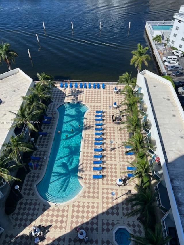 birds eye view of property featuring a water view