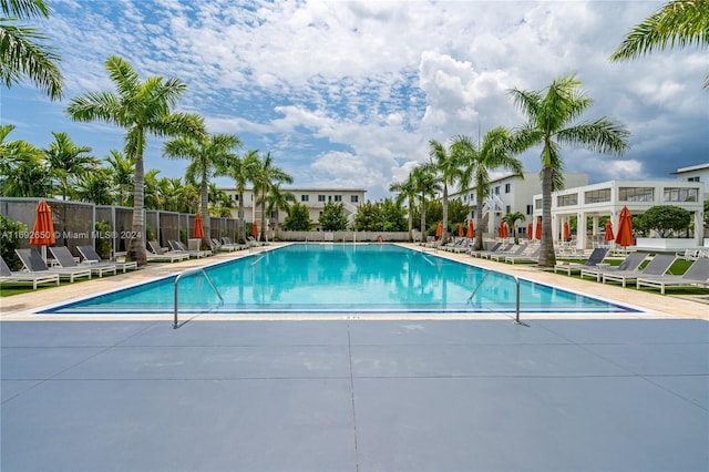 view of swimming pool with a patio