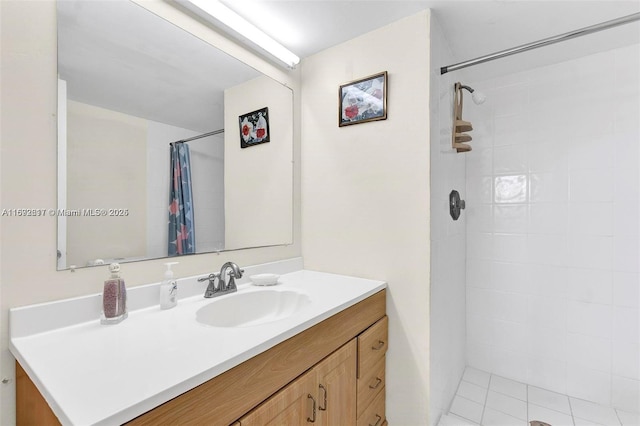 bathroom with vanity, tile patterned floors, and a shower with shower curtain