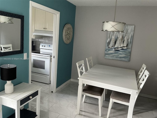 dining area with vaulted ceiling