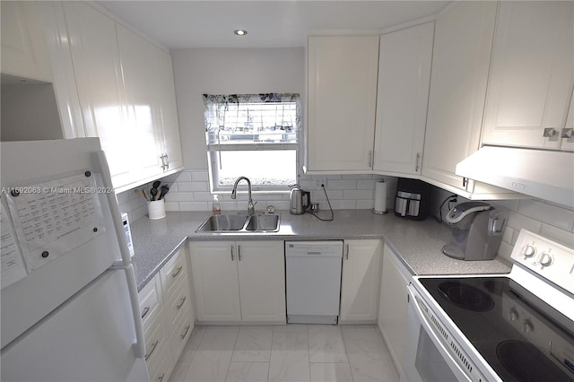 kitchen featuring white cabinetry, sink, and white appliances