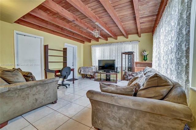 6525 Mayo St, Hollywood, FL 33023 - living area with a wood ceiling with exposed beams, light tile patterned flooring, and a desk