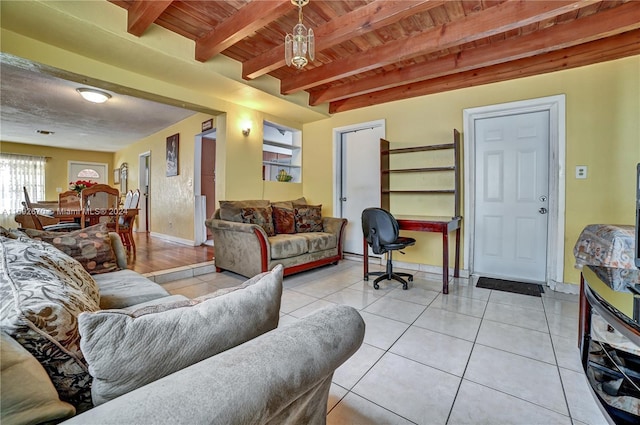 6525 Mayo St, Hollywood, FL 33023 - living area featuring a wood ceiling with exposed beams, light tile patterned floors, and an office area