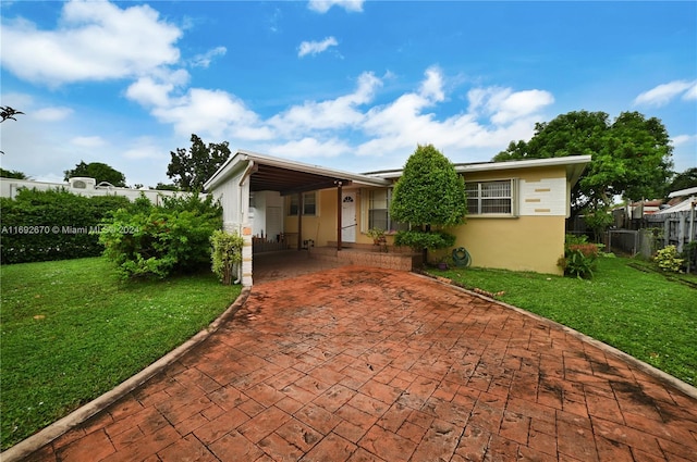 6525 Mayo St, Hollywood, FL 33023 - view of front facade featuring stucco siding