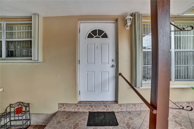 6525 Mayo St, Hollywood, FL 33023 - doorway to property with stucco siding