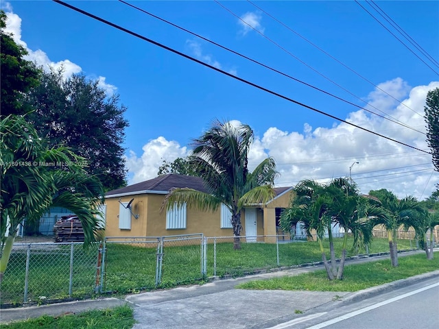 view of front of home with a front yard