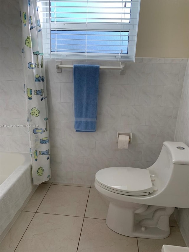 bathroom featuring tile walls, toilet, tile patterned floors, and shower / bathtub combination with curtain