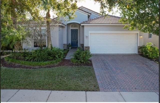 view of front of home featuring a garage