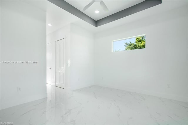 empty room featuring ceiling fan