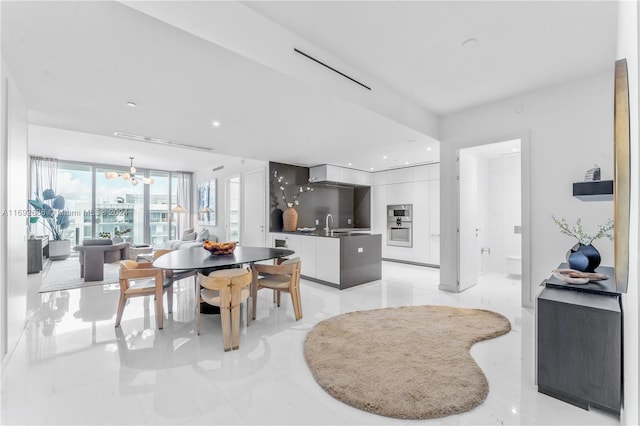 dining area featuring a chandelier