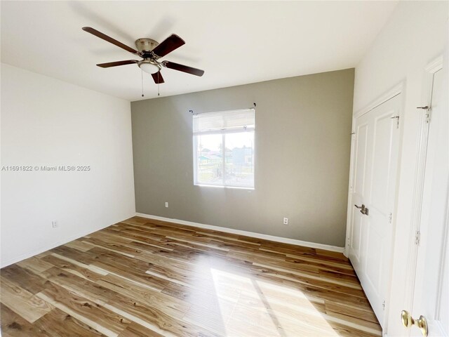 stairway featuring hardwood / wood-style floors