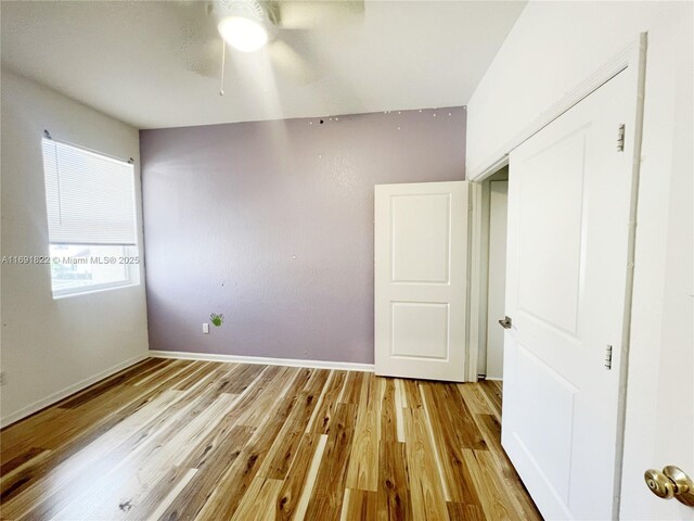 bathroom with toilet, vanity, and a shower with shower curtain