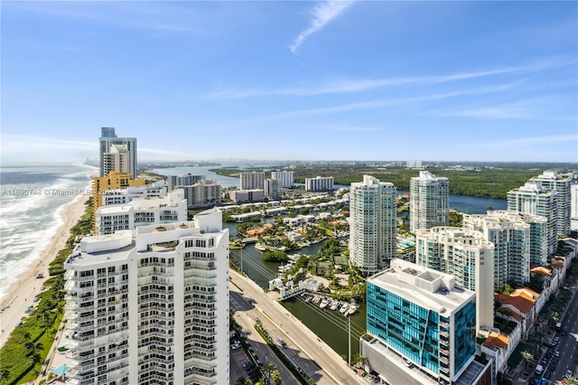 city view featuring a beach view and a water view