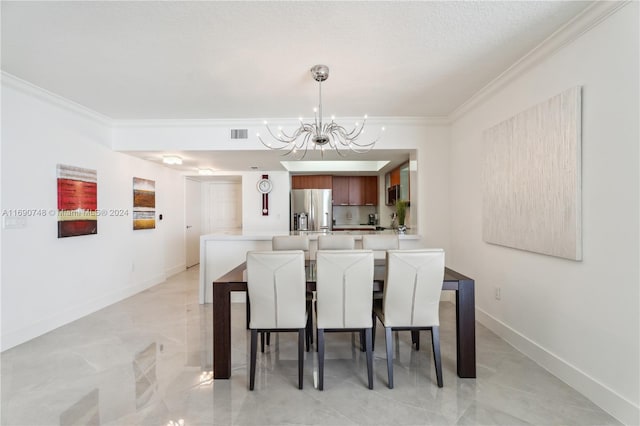 dining space featuring a chandelier, a textured ceiling, and crown molding