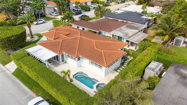 8801 Dickens Ave, Surfside, FL 33154 - aerial perspective of suburban area with a pool area