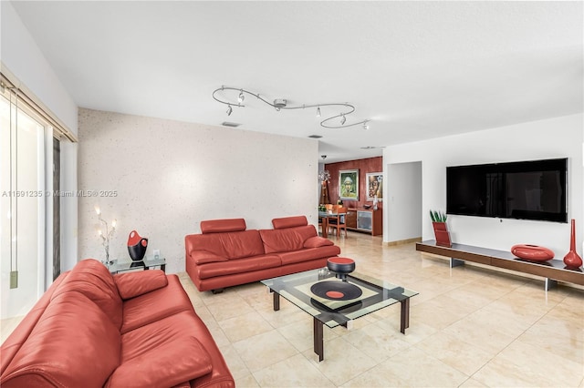 living area with rail lighting