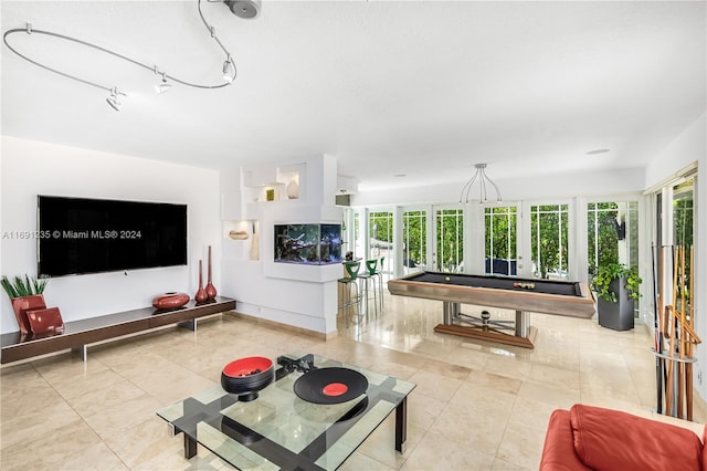 living room featuring light tile patterned floors, billiards, and french doors