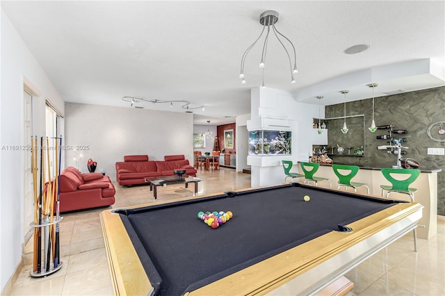 playroom with billiards, tile patterned flooring, and rail lighting