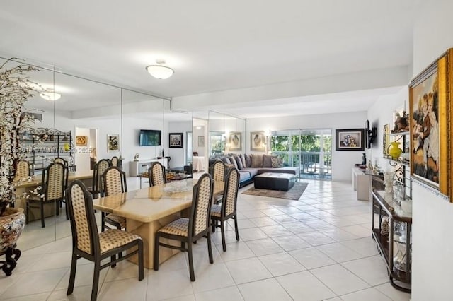 9111 E Bay Harbor Dr Unit 3E, Bay Harbor Islands, FL 33154 - dining area with light tile patterned floors