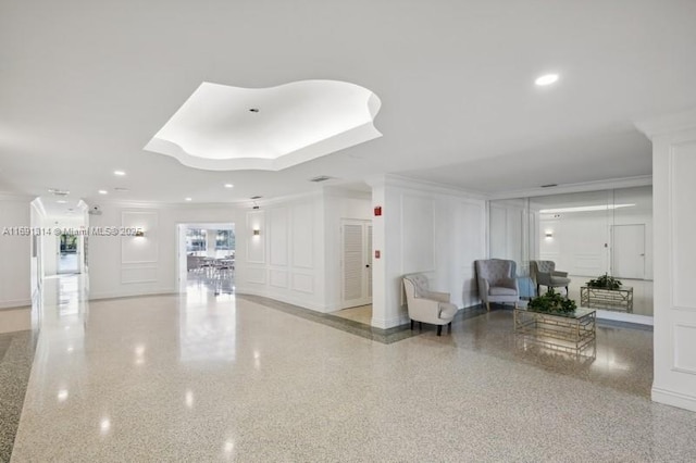 9111 E Bay Harbor Dr Unit 3E, Bay Harbor Islands, FL 33154 - lobby featuring a decorative wall, crown molding, and recessed lighting