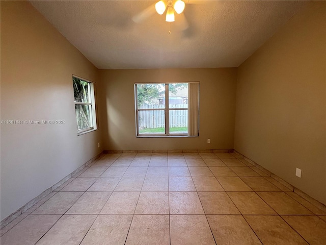 bathroom featuring tile walls, vanity, and toilet