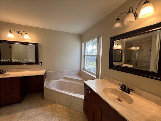 bathroom with lofted ceiling, vanity, tile patterned floors, and shower with separate bathtub