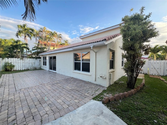 rear view of house with a patio area