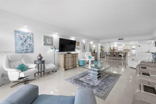 living room with light tile patterned floors