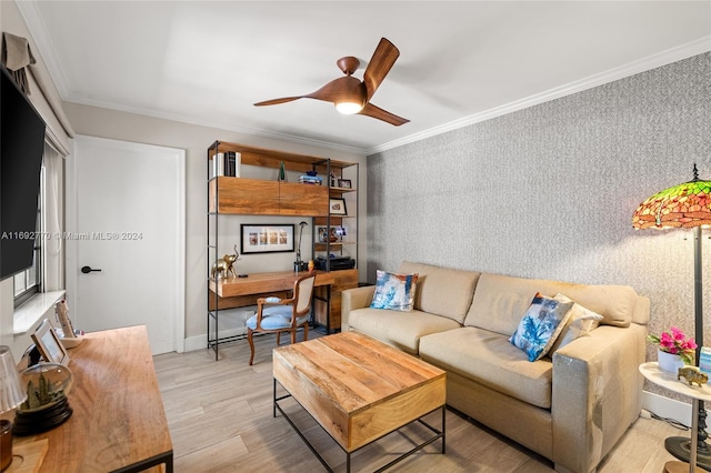 living room with light wood-type flooring, ceiling fan, and ornamental molding