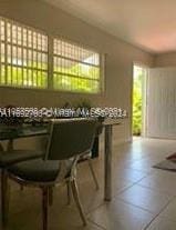 dining area featuring tile patterned floors