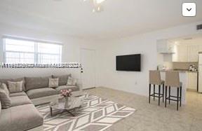 living room featuring ceiling fan