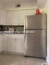 kitchen with stainless steel refrigerator