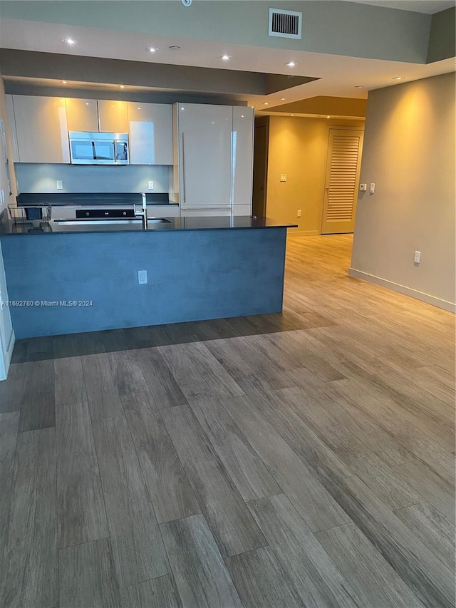 kitchen with light hardwood / wood-style floors