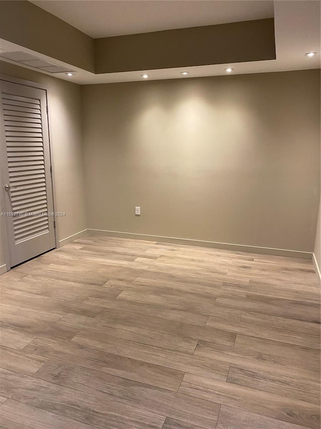 empty room with light wood-type flooring