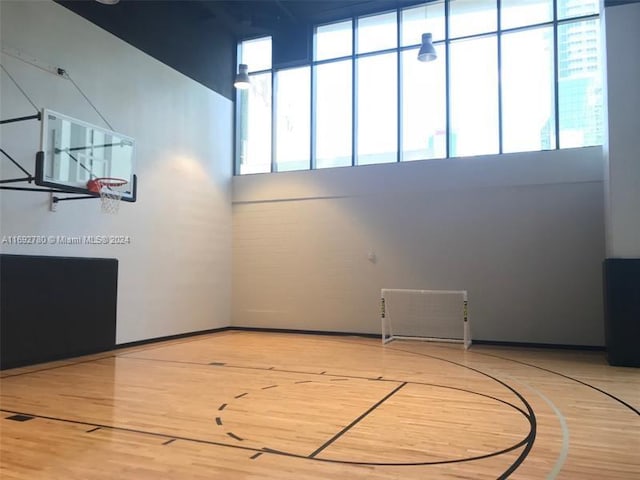 view of basketball court with a wealth of natural light