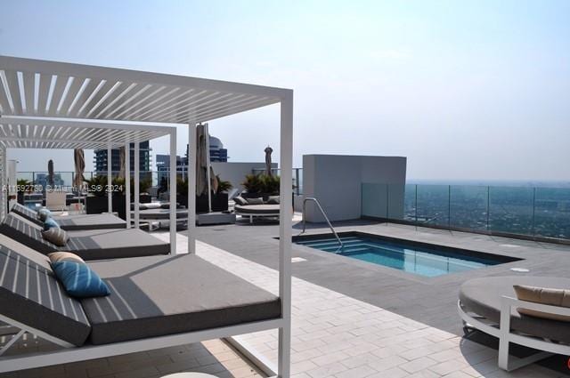 view of pool featuring a pergola and a patio area