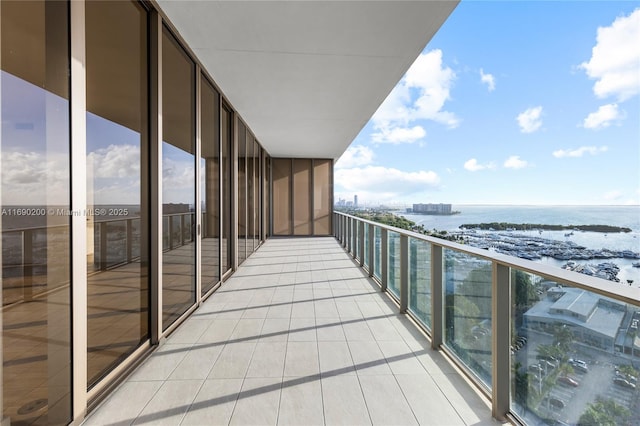 balcony featuring a water view