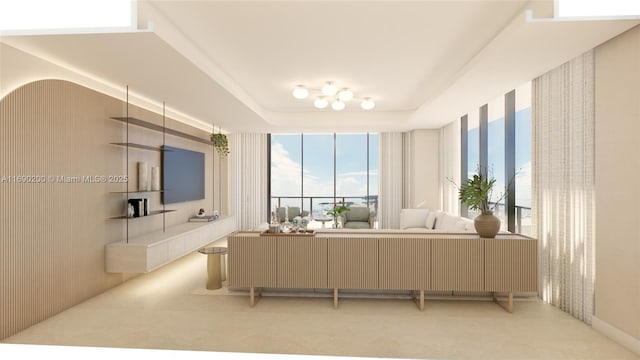 living room featuring a tray ceiling and arched walkways