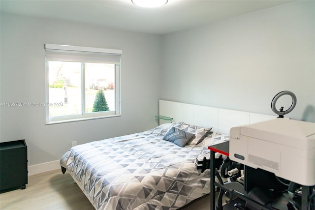 bedroom featuring light hardwood / wood-style floors