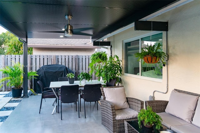 view of patio with grilling area and ceiling fan