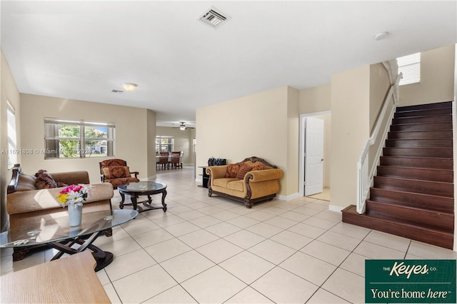 living room with light tile patterned flooring