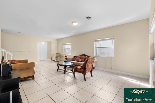 living room with light tile patterned floors