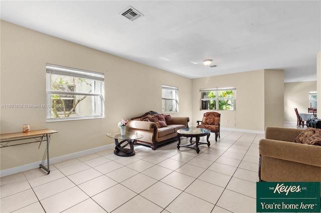 living room with light tile patterned flooring