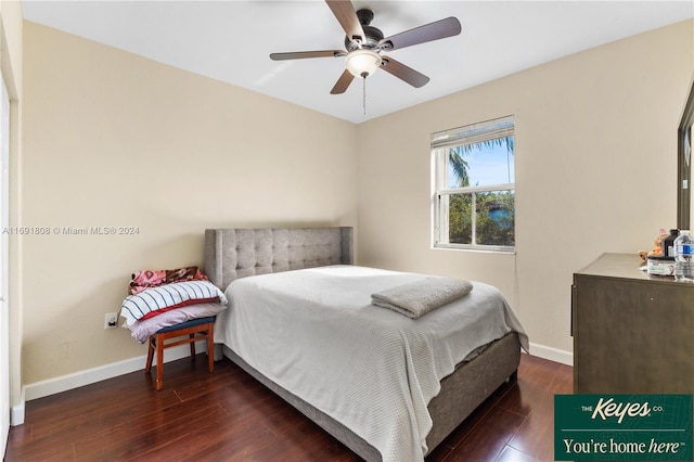 bedroom featuring dark hardwood / wood-style floors and ceiling fan