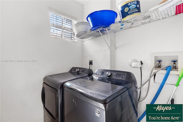 laundry room featuring washer and clothes dryer