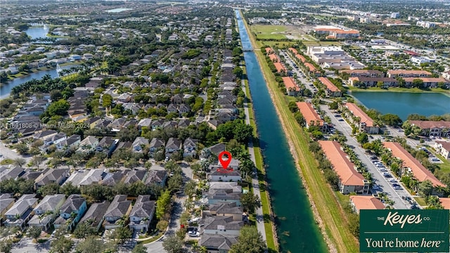 bird's eye view with a water view