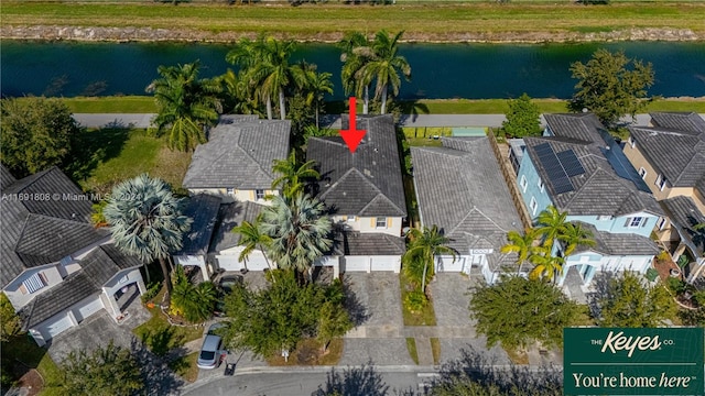 drone / aerial view with a water view