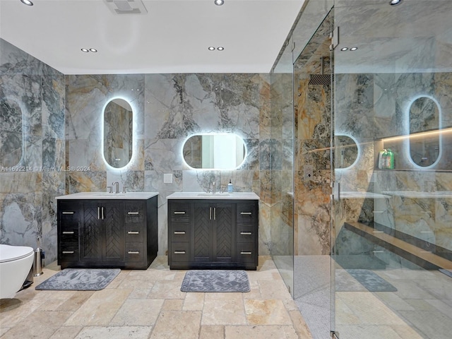 bathroom with a shower, vanity, and tile walls