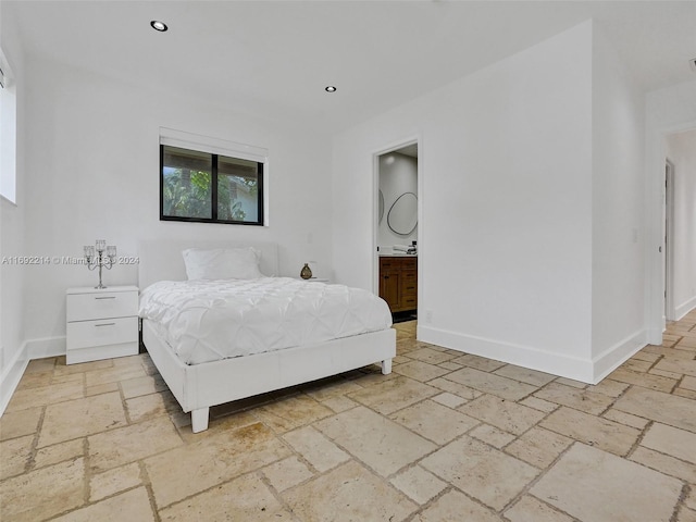 bedroom with ensuite bath