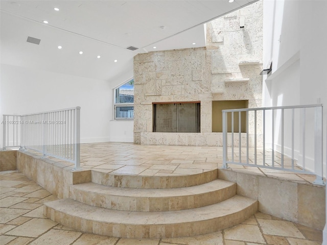 stairway with a towering ceiling